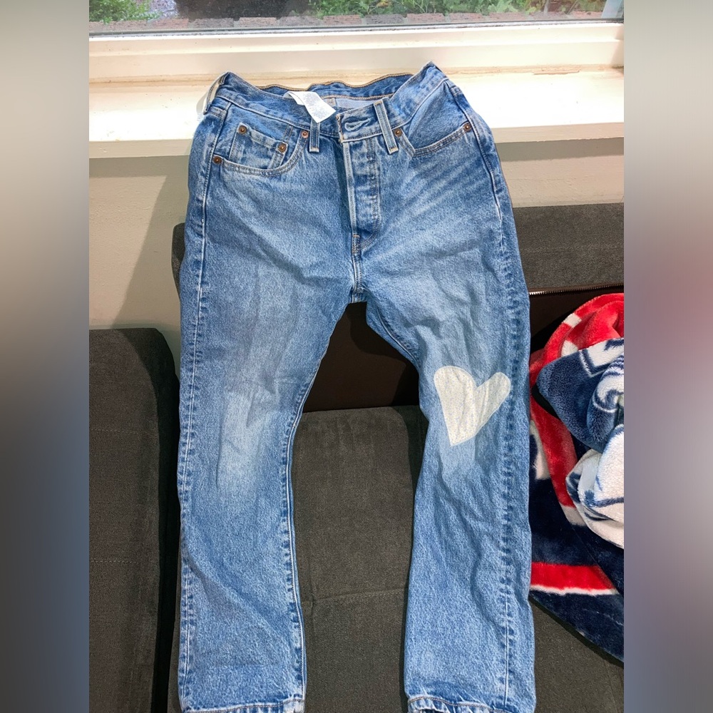 501 jeans with heart patch